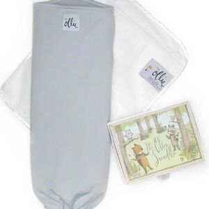 Ollie swaddle washed once, gray, in excellent condition with original box.